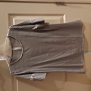 Tunic length ruffle accent sleeve top